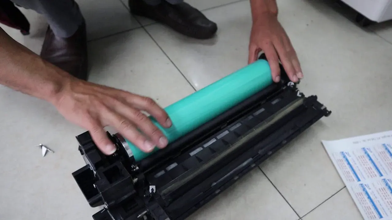 Máy photo bị đen mép giấy